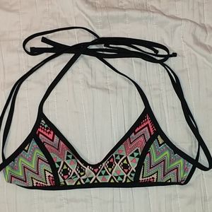 Swim top multi color. Has padding. Can be removed